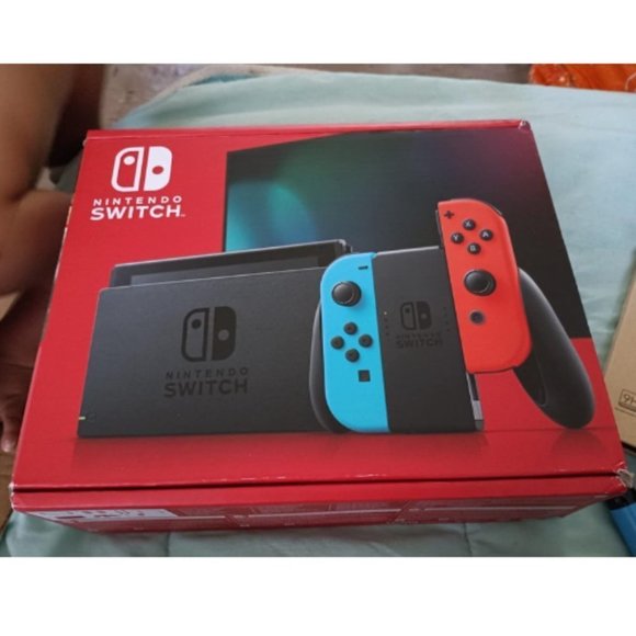 Nintendo Switch™ with Neon Blue and Neon Red Joy‑Con™ - Picture 6 of 7